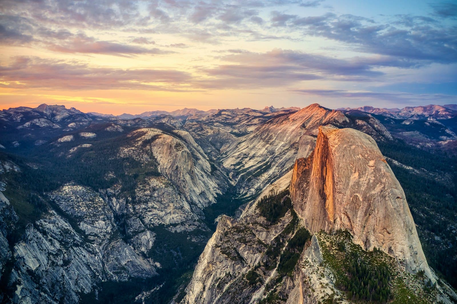 Rugged granite mountain range glowing in the evening light